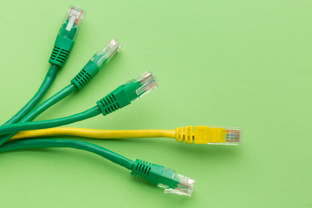 Comparison of network cable types including Cat5e, Cat6, Cat6A, and fiber optic cables